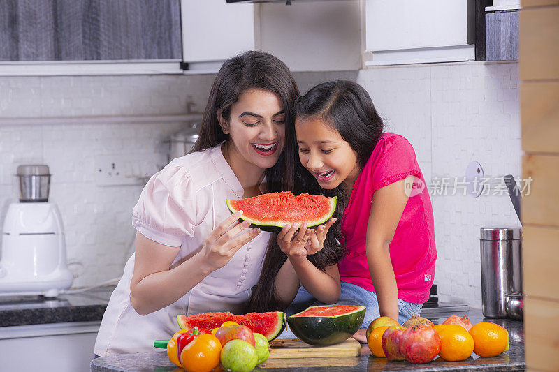 Happy family in the kitchen. stock photo